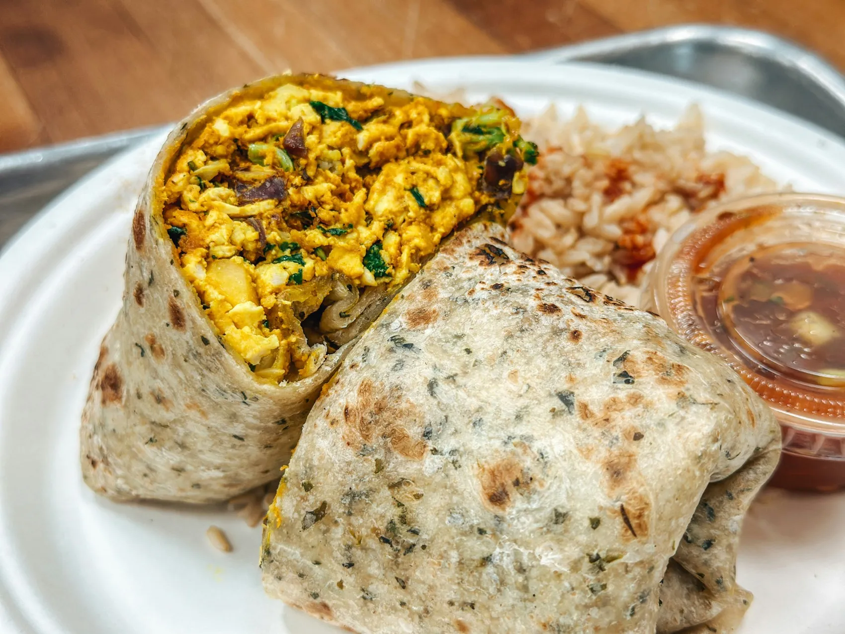 Breakfast burrito with rice and salsa