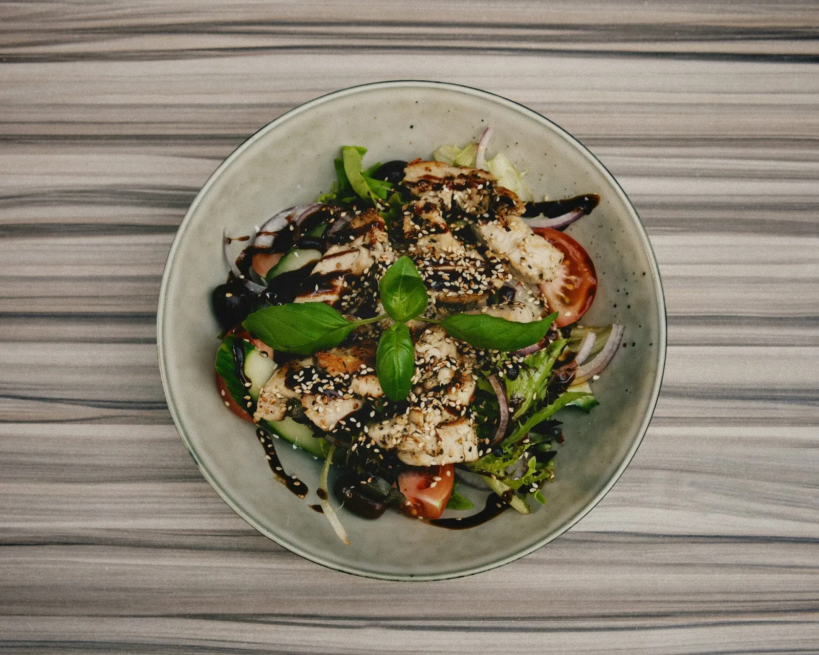 Grilled chicken salad with balsamic, tomato and basil